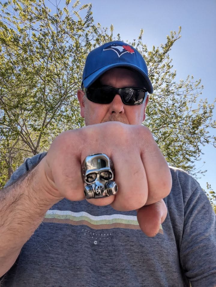 Freak Family member showing an ATOMIC FREAK skull ring